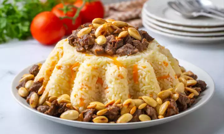 Gelinim Mutfakta'da günün yemeği Bademli Acem Pilavı nasıl yapılır? Bu tarifle iftar sofralarınız şenlenecek 6 69a029492f3815012604ac6b