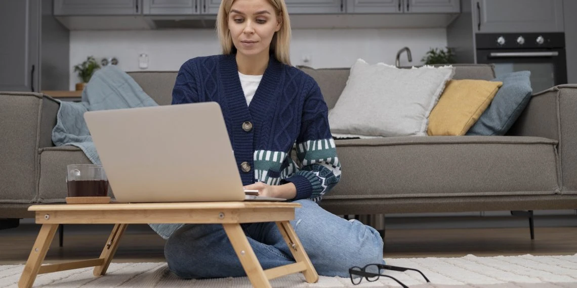 full shot woman working laptopd 1140x570 1